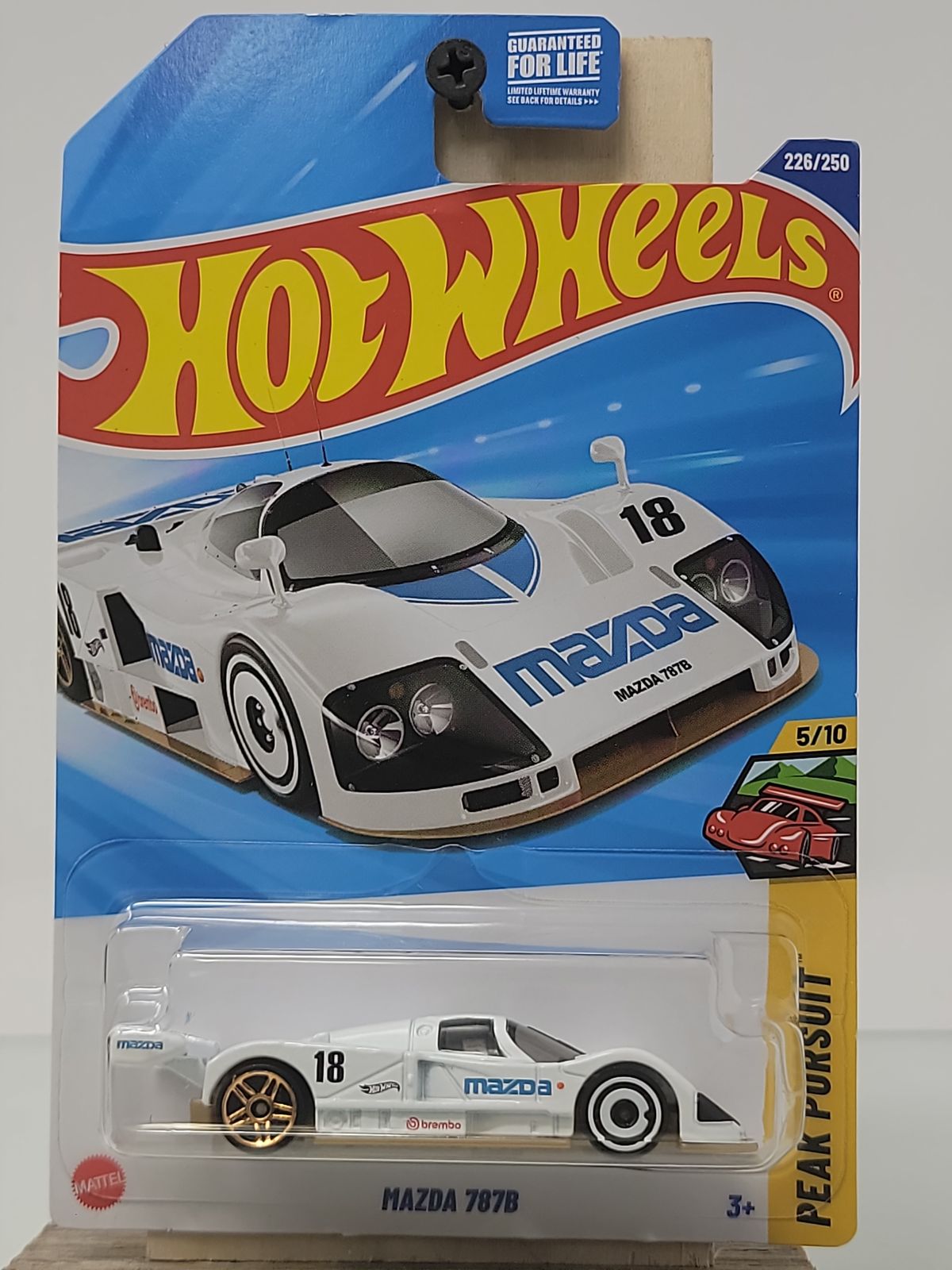 Hot Wheels Mazda 787B – White/Blue – Peak Pursuit 5/10 – Factory Sealed