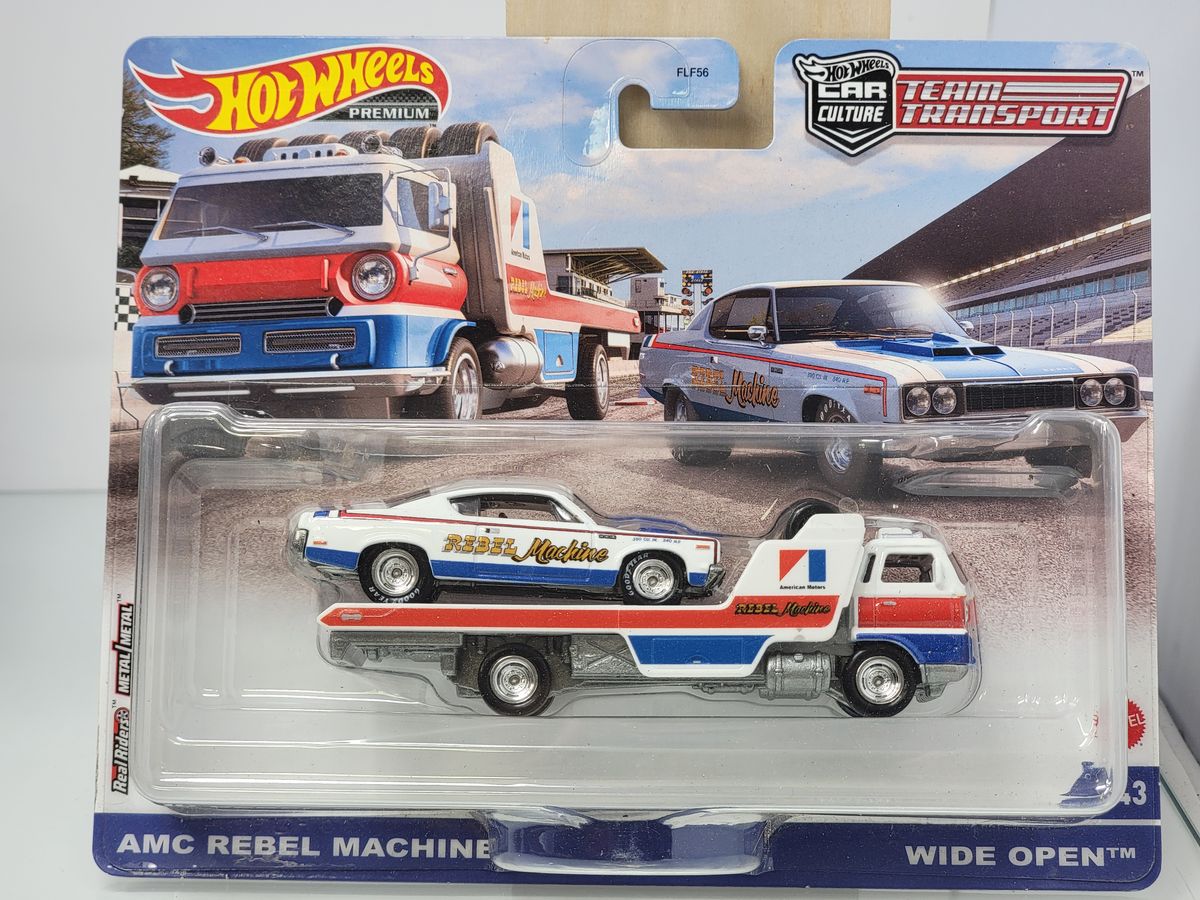 HOT WHEELS PREMIUM TEAM TRANSPORT – AMC REBEL MACHINE & WIDE OPEN HAULER – RED/WHITE/BLUE LIVERY – SEALED