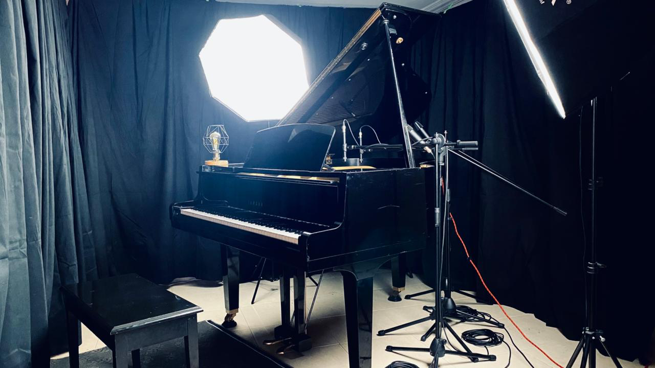 Grand piano and microphones in Carlos Maya's recording space