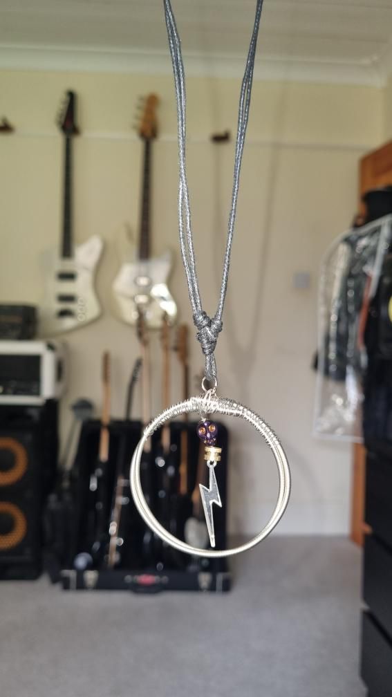 CUSTOM THUNDER SKULL BASS STRING NECKLACE