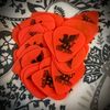 The Just Logo Guitar Picks – Orange 5 Pack (0.60mm)