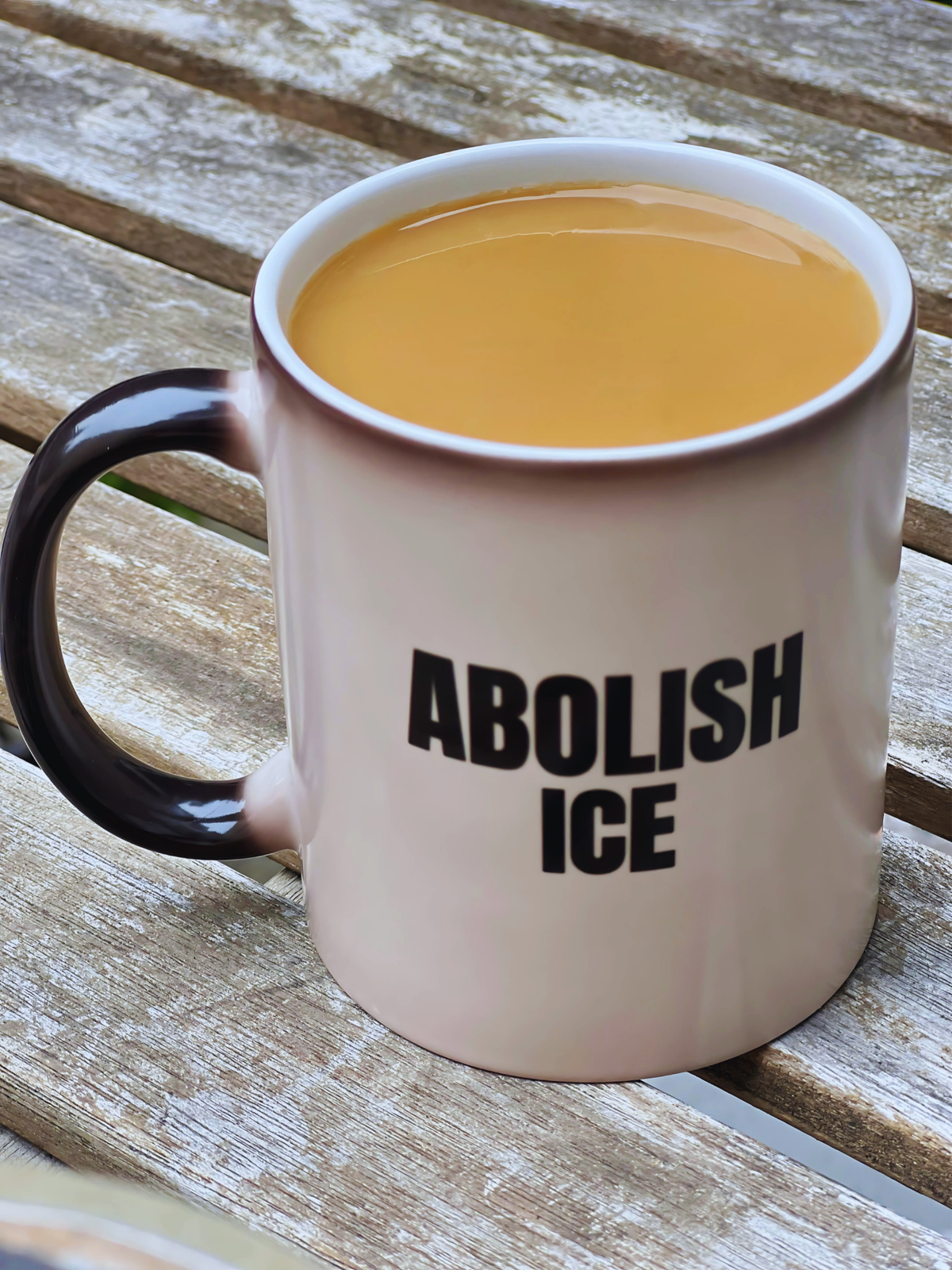 “ABOLISH ICE” heat-reactive mug