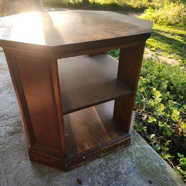 Octagon table solid walnut with veneer top.