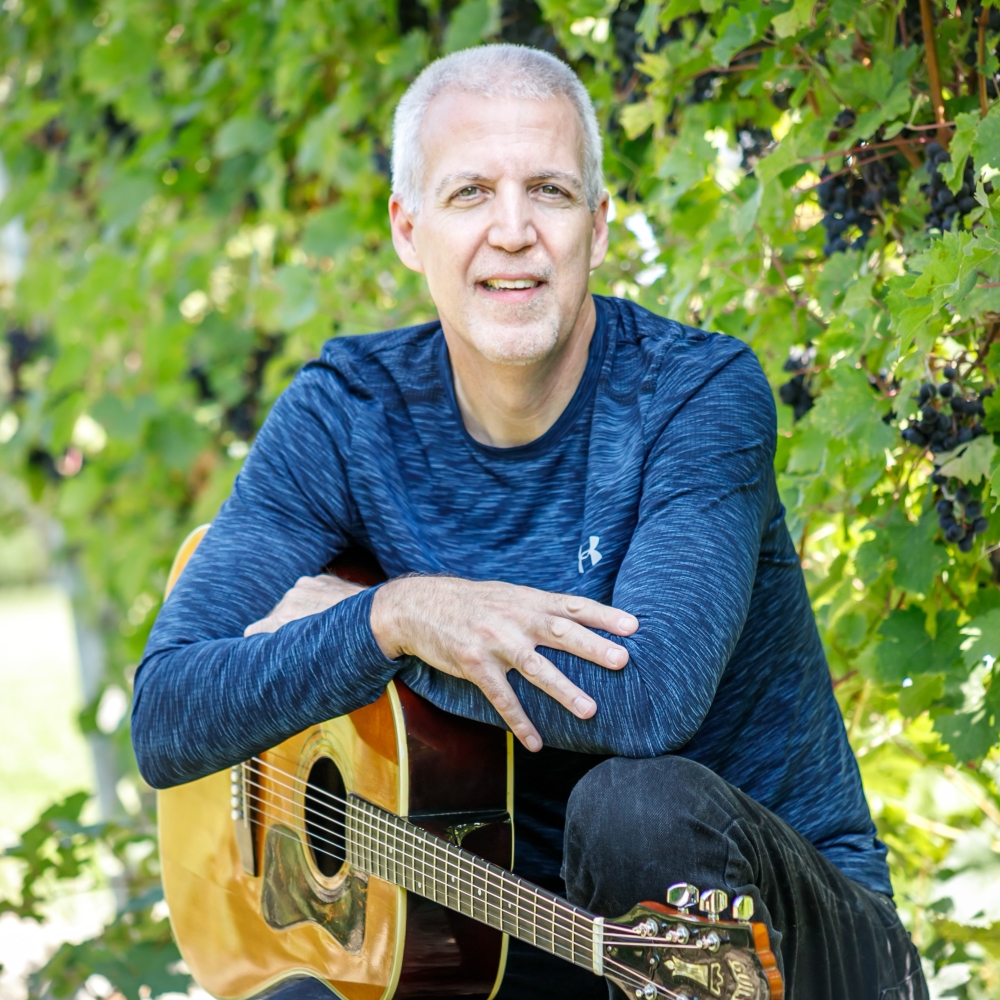 Mike Lucey with Guild D44