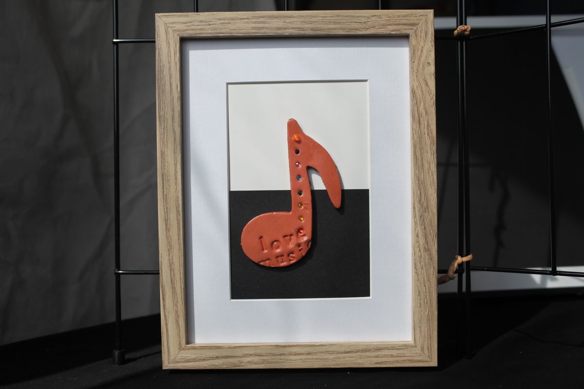 Framed Ceramic Musical Note with "love music" indentation