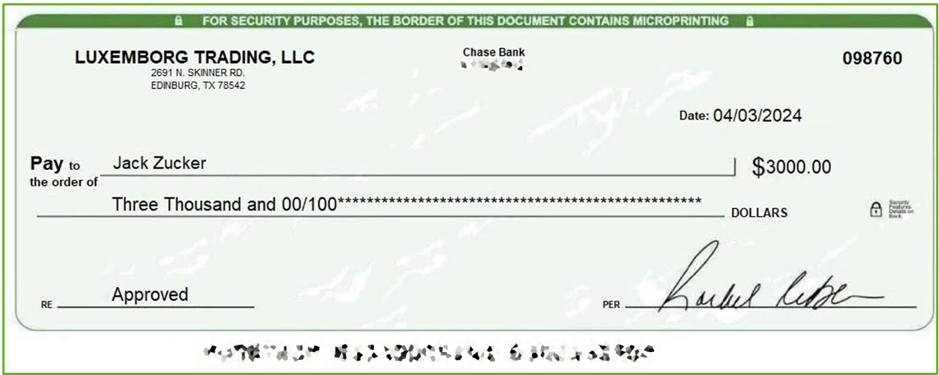 A close-up of a check
Description automatically generated