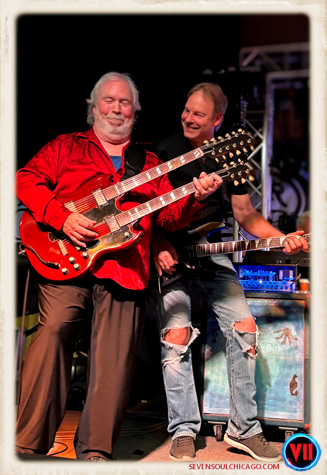 Rich and Jay playing on stage together