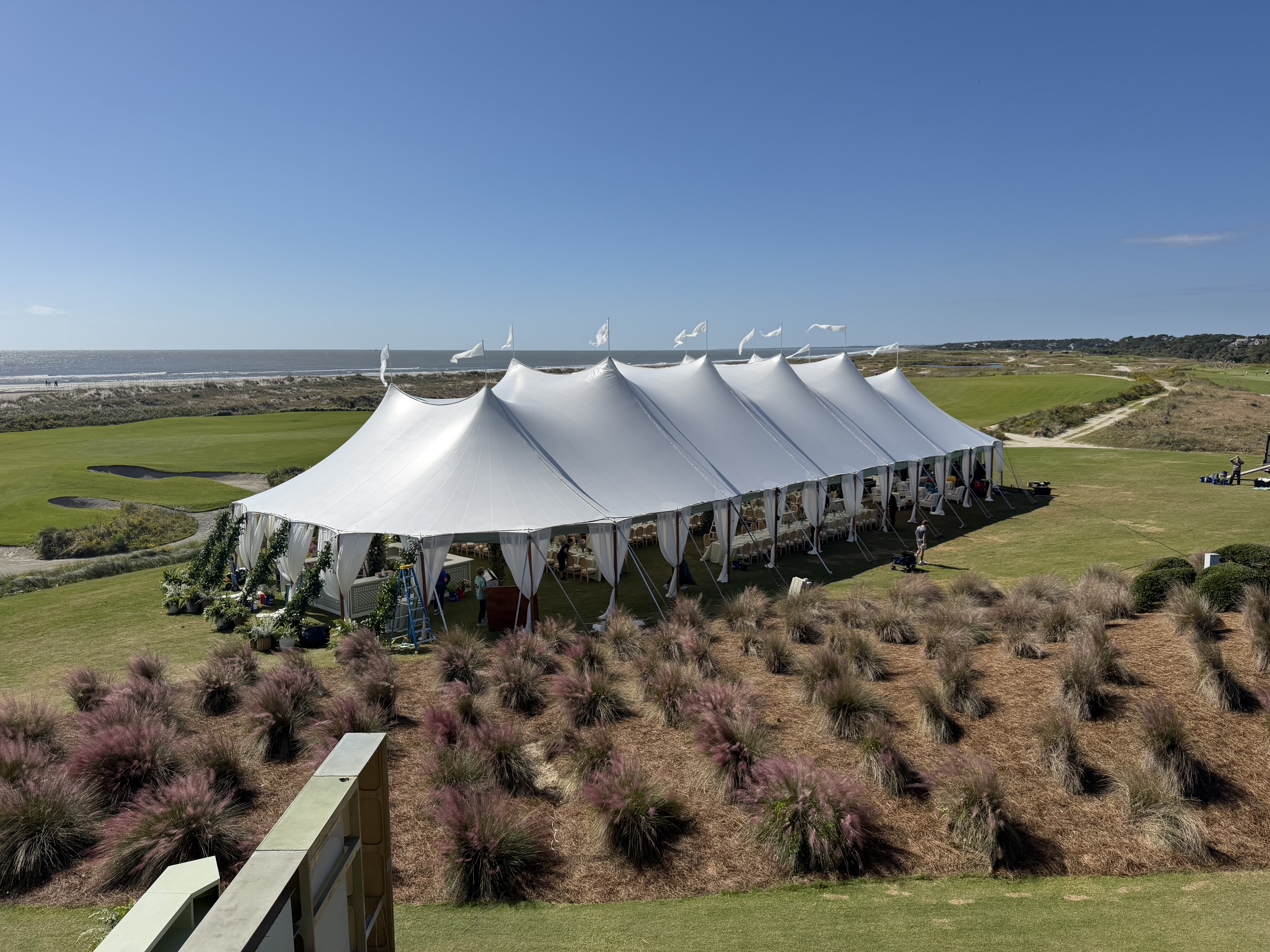 Luxury sailcloth wedding tent on the oceanfront lawn at Kiawah Island Golf Resort featuring Perfect 10 Band