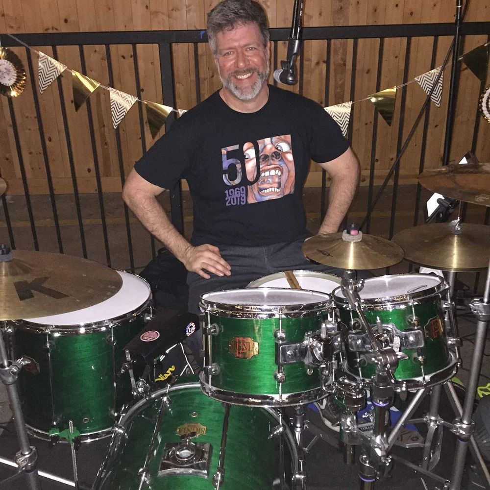 Chris “Coz” Costello, Drums / Vocals / Percussion