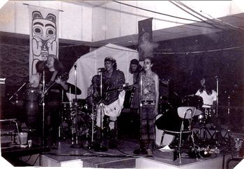 Trevor Salloum as guest with the band Brain Damage: Bing Jensen (guitar,vocals) Joel Bert (congas, percussion) Gary Cramer (guitar, vocals), Helen Davis (vocals) Dave Engleman (bass), Randy Clark (drums) Notre Dame University, Nelson, BC 1974.
