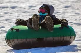Tubing on the Green Gables sled hill
