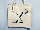 x* Tote Bag