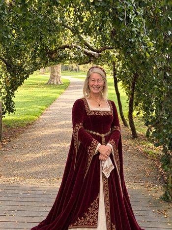 Lady Debbie, courtesy of AI. The garden was real; the royal wardrobe got a little digital assistance.
