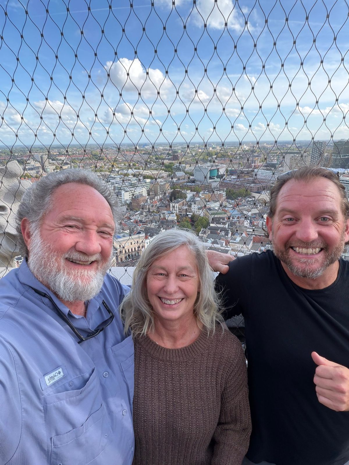 Debbie, Chad, and me at the Dom Tower, with Utrecht spread out below.