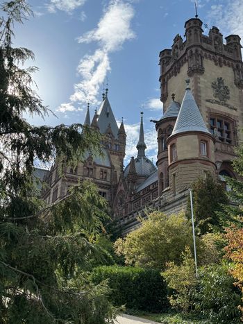 Schloss Drachenburg, Königswinter. Castle towers against a blue sky. Germany supplied another reason to look up.
