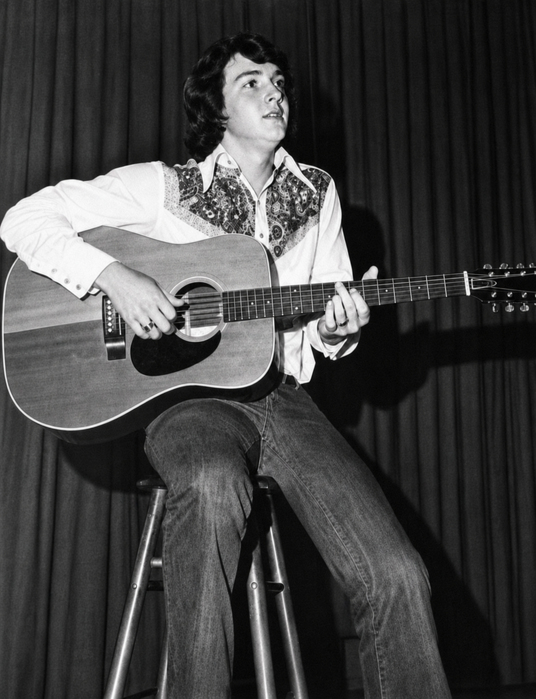 Young Bill performing with his blonde twelve-string Guild at the junior-high talent show
