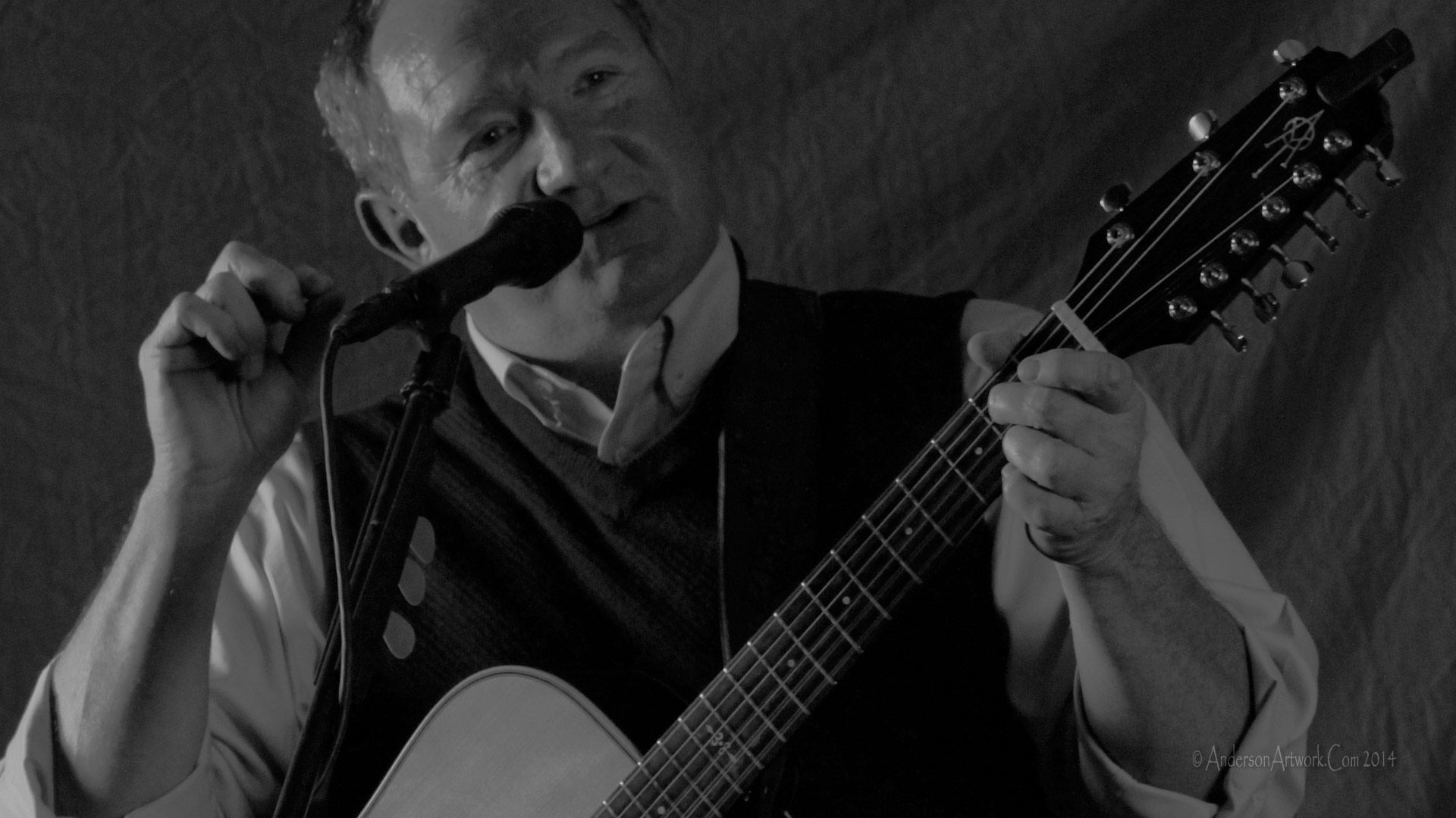 Bill at the microphone during an early show