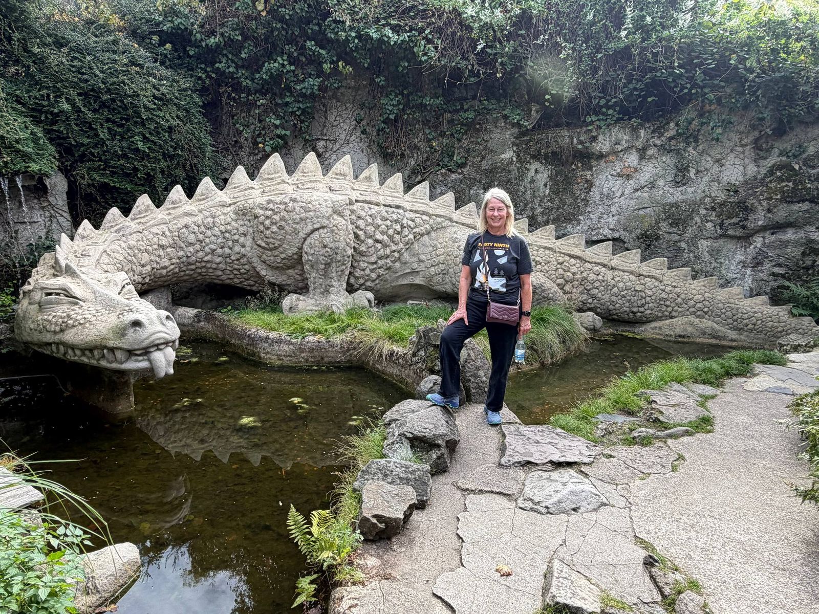 Debbie with the stone dragon at the Nibelungenhalle, Königswinter. A very patient photo companion.