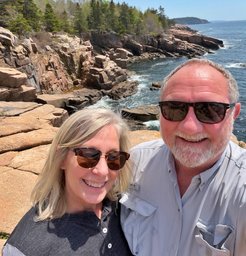 Bill and Debbie beside the rocky Maine coast