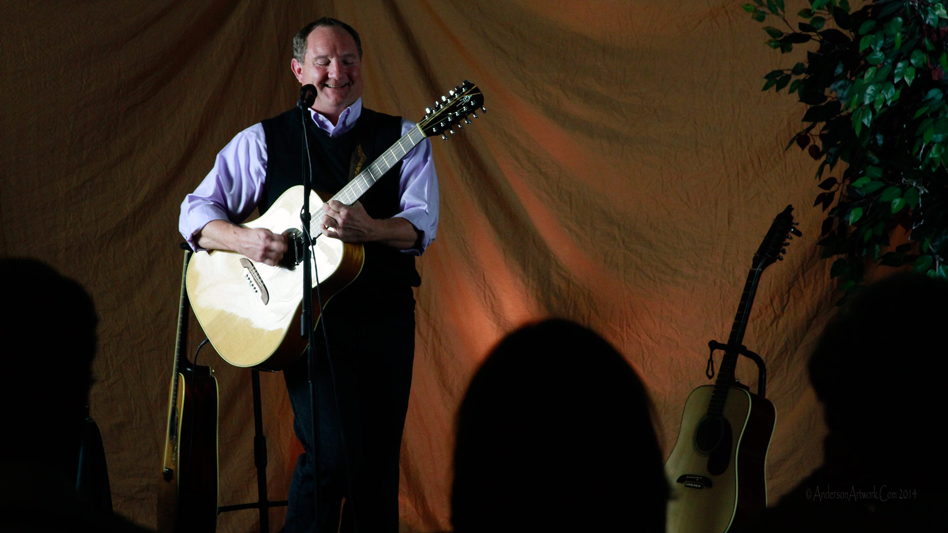 Bill smiling during an early live performance