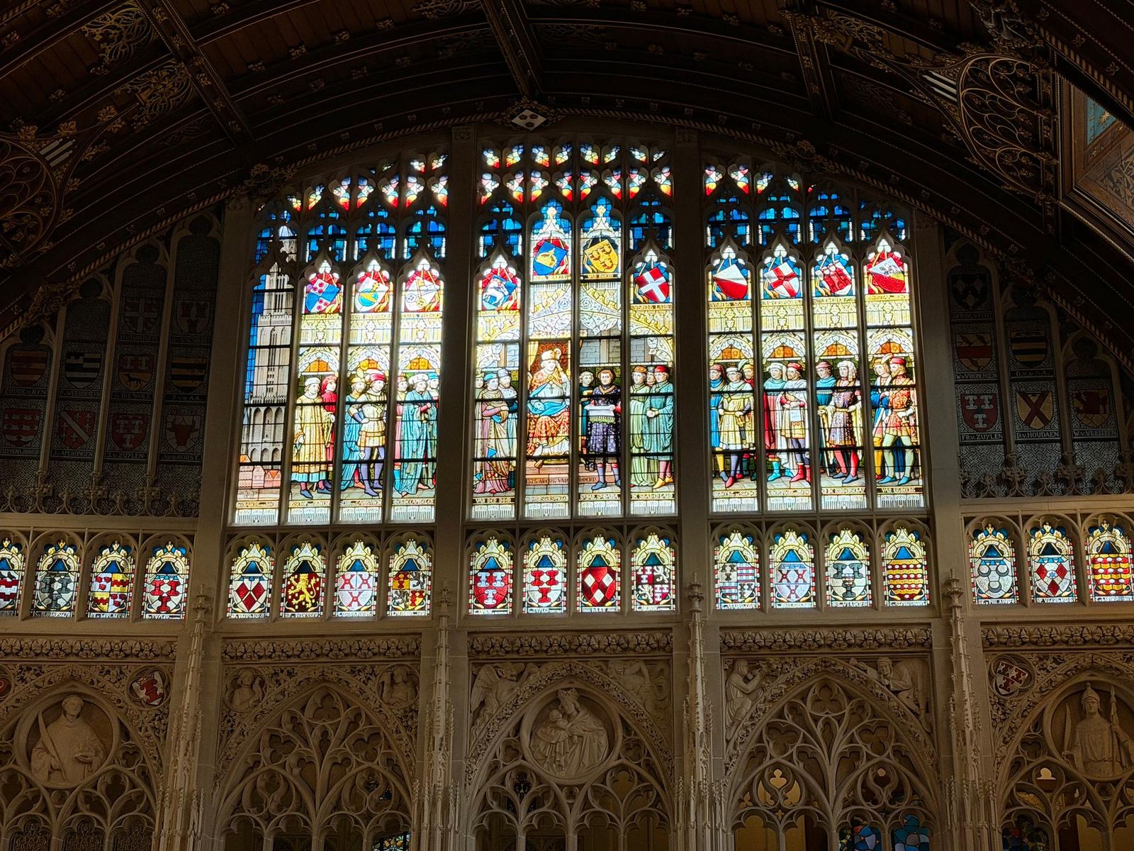 Kasteel de Haar, near Utrecht. Stained glass above the carved gallery in the great hall.