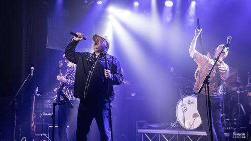 Forgotten Gods performing live on stage.