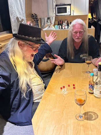 Promoter Tom Wolke (and Townes Van Zants dice) playing Threes.
