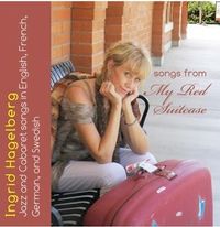 One-Woman Show: My Red Suitcase Open Wide
