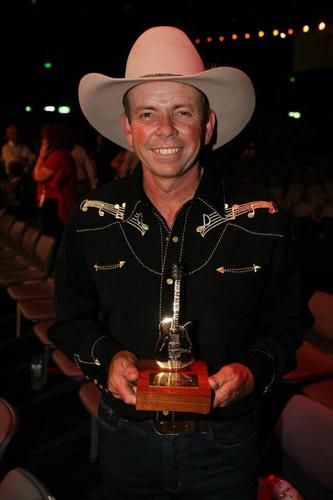 Dean with his Bush Ballad Of The Year Golden Guitar Award 2012
