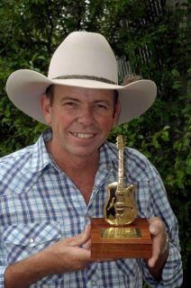 Dean with his Bush Ballad Of The Year Golden Guitar Award 2012
