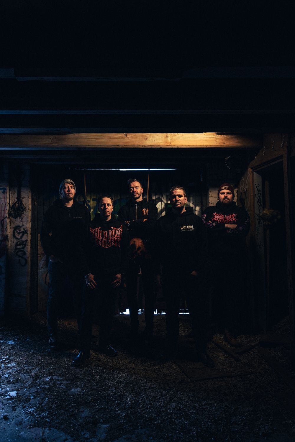 Ashes of Perishing band promo shot 2026 in abandoned mill