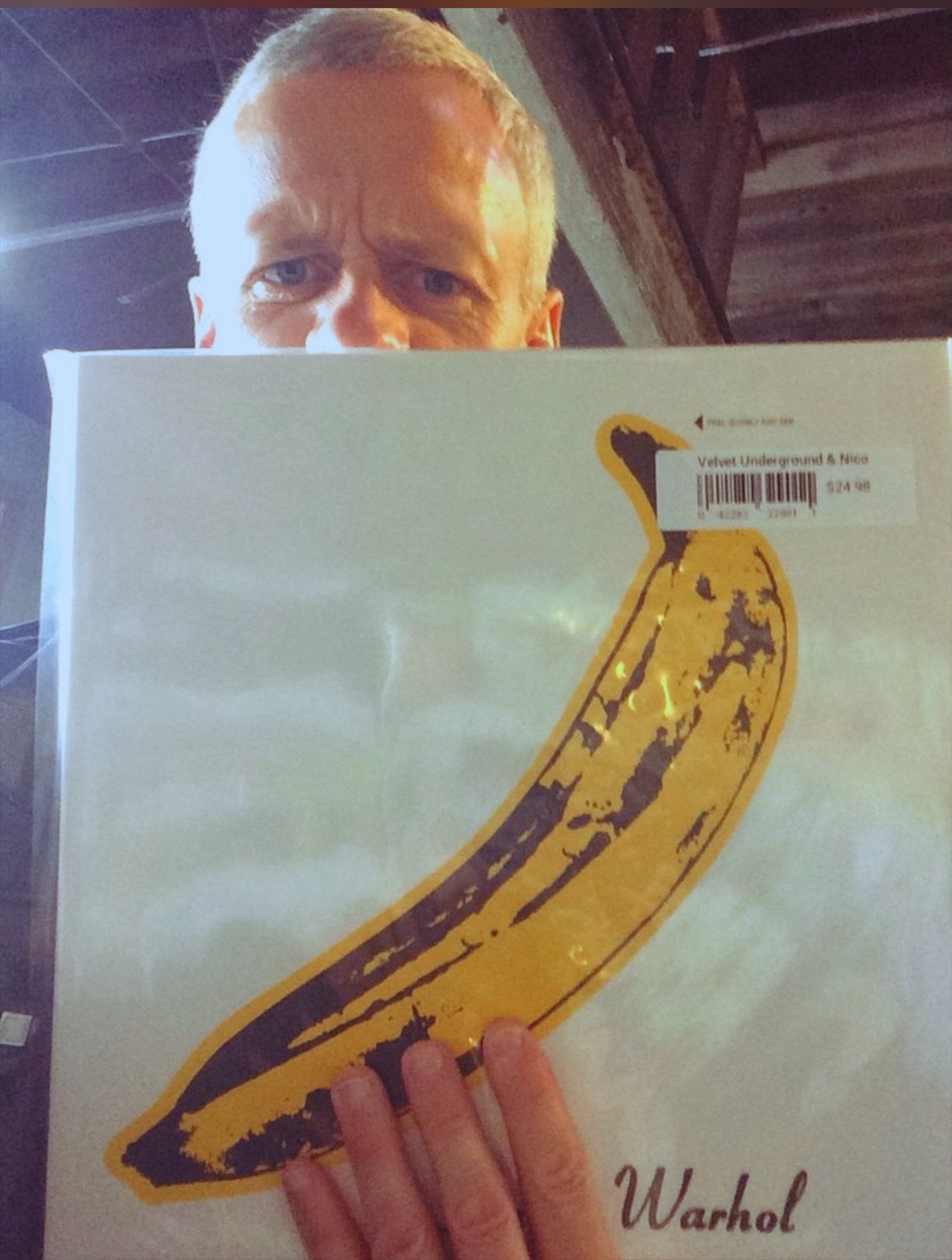 patrick tape fleming holding a copy of velvet underground and nico
