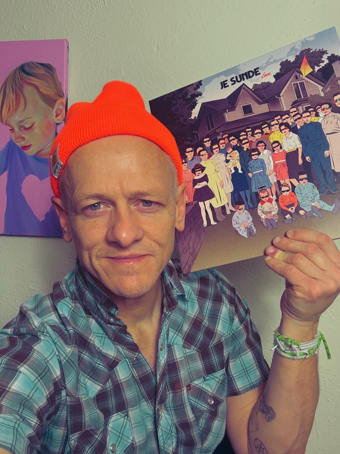 Patrick Tape Fleming holding JE Sunde 9 songs about love