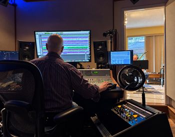 Bob St. John and Matthew Shad working in the recording studio on Mirror, the October 2026 single by singer and songwriter Chris Green, released through Crimson Star Records
