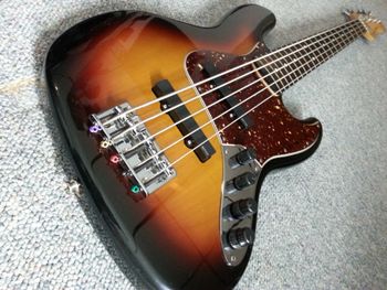 Coops bass. ..to this...(after)...with emgs pickups and preamp...done by slammin dat bass.
