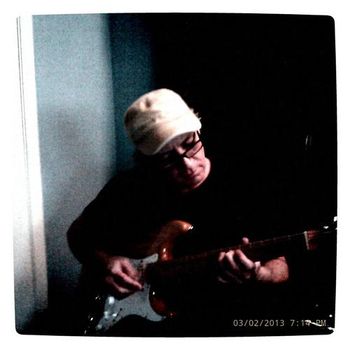 Larry Graves overdubs a couple guitar parts.
