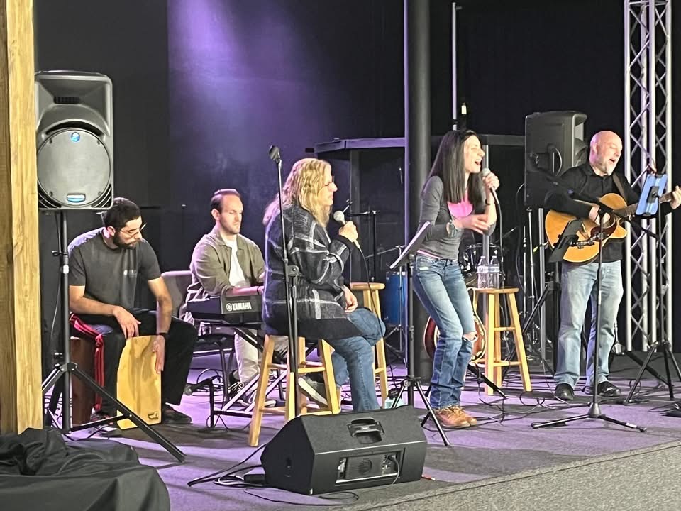Laura Breece Band singing on stage at Recovery Cafe!
