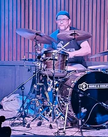 Chuck on Drums.
