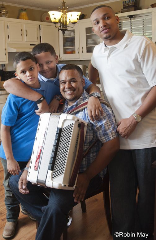 Corey Arceneaux and his sons.
