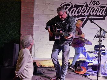 Rob chatting with a new fan, Kathy, about "One Horse Town" by Blackberry Smoke.
