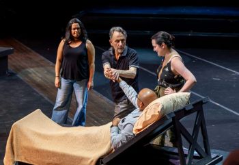 Rehearsing as Laurentino, from Cruzar la Cara de la Luna. Opera San Antonio 2024. by Bria Woods. From the left, Cecy Duarte (Renata), Lenny Foglia (Director and librettist), Sarah Coit (Diana), and Octavio Moreno on the bed.

