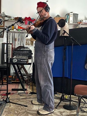 Teilhard on the fiddle
