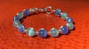 Blue/Teal glass bead & Copper spiral bracelet 