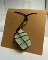 Aquamarine wire-wrapped with brown leather necklace