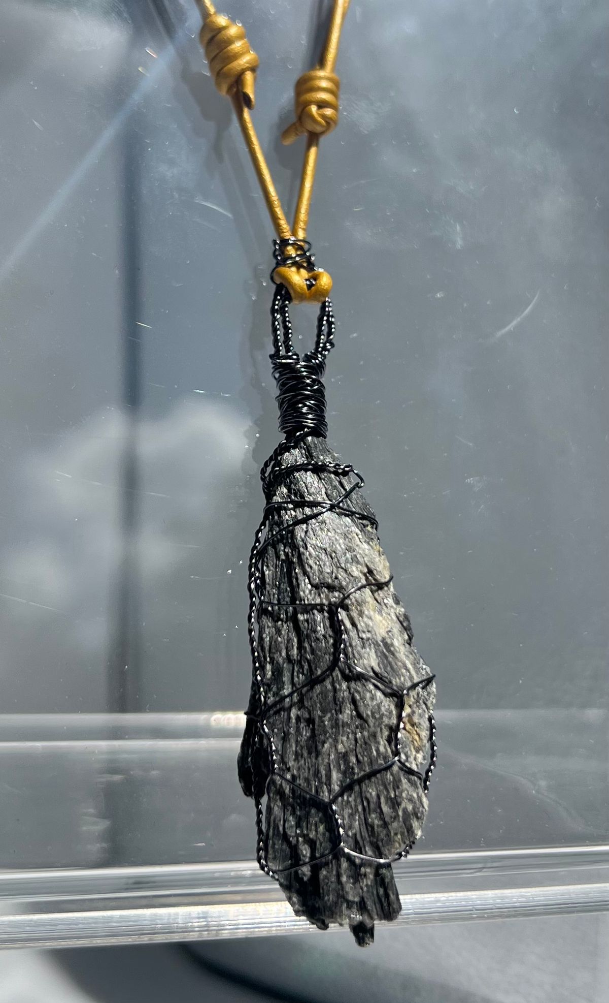 Black Kyanite stone with yellow leather necklace