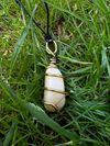 Orange Calcite wire-wrapped with black leather necklace
