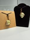 Infinite wire-wrapped with black leather necklace