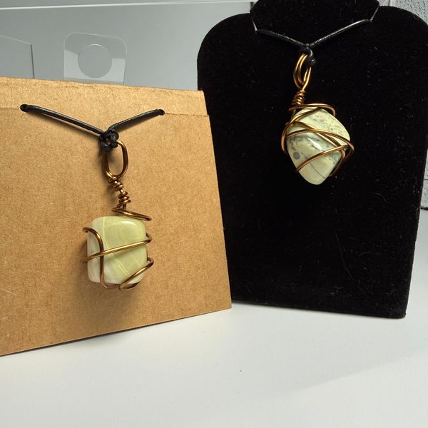 Infinite wire-wrapped with black leather necklace