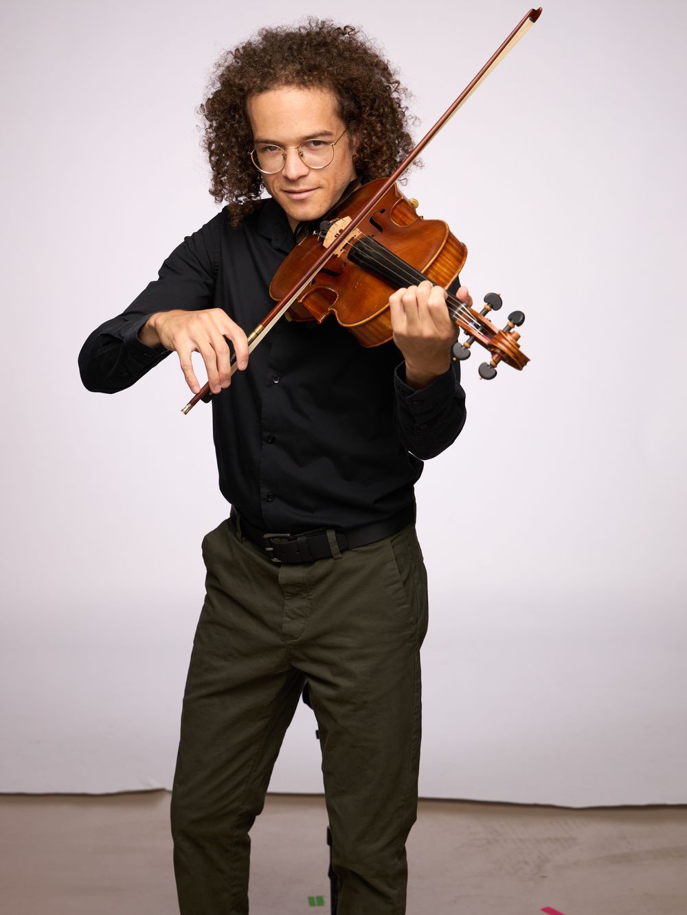 Seth Pae holding viola