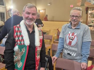 choir-members-socialize-at-sectional-practice-social-chirstmas-sweater-themed